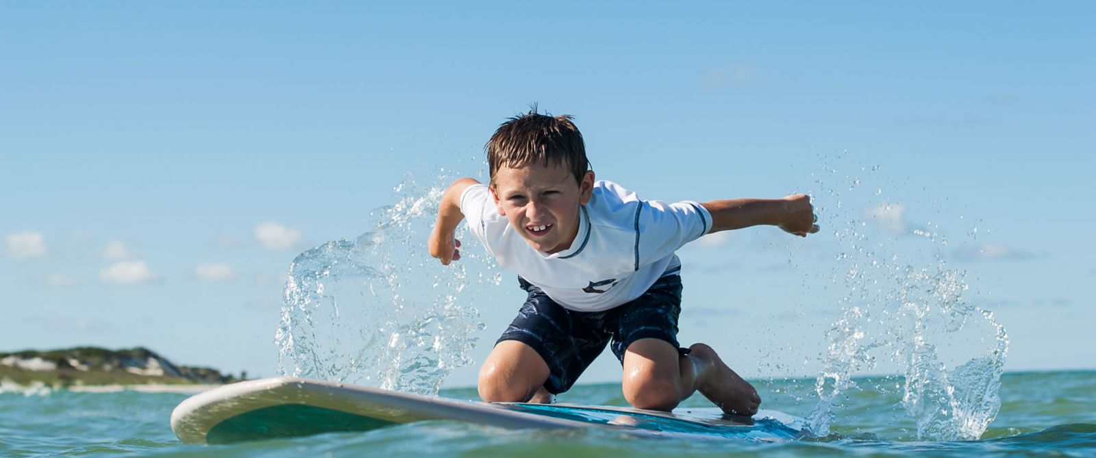 Background image of boy on paddleboard